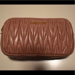 MIU MIU
Nappa Matelasse Double Zip Pochette Clutch Loto Come with Strap.